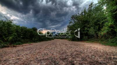 Storm Clouds Over A Mountain Road.  HDR Time Lapse Shot Motorized Slider
