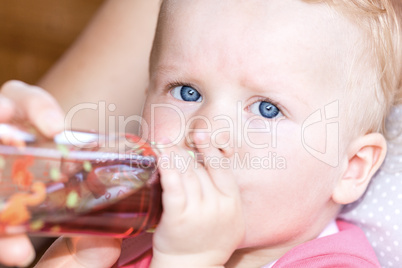 Baby drinking from the bottle