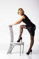 lovely young woman wth chair