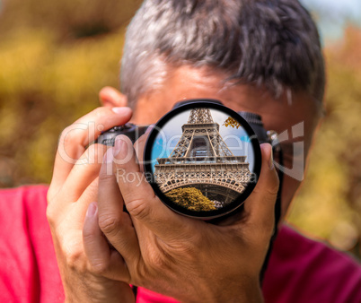 Tourist capturing a shot of Eiffel Tower, Paris