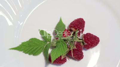 Raspberries on a plate. Top view.