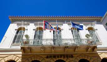 the building with flags of greece, eu and kalamata city, pelopon