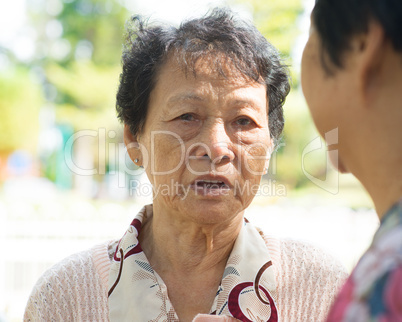 Sadness senior woman telling sad story