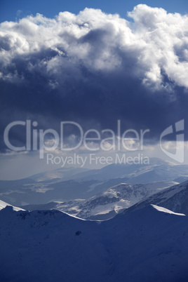 snow mountains and storm clouds