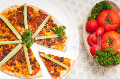 Turkish beef pizza with cucumber on top