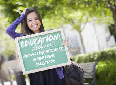 Mixed Race Female Student Holding Chalkboard With Education and
