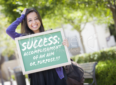 Mixed Race Female Student Holding Chalkboard With Success and De