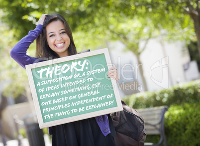 Mixed Race Female Student Holding Chalkboard With Theory and Def