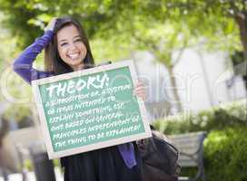 Mixed Race Female Student Holding Chalkboard With Theory and Def