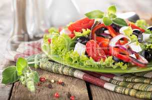 Vegetable salad on a wooden table