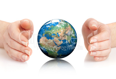 Hand of the person holds globe.