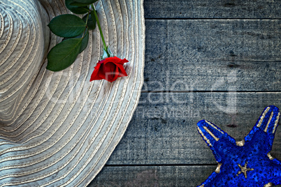 Womans summer hat with red rose