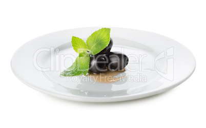 Olives on a white plate
