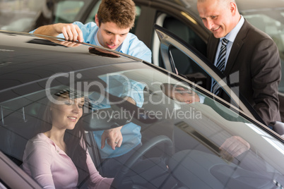 Caucasian couple choosing car