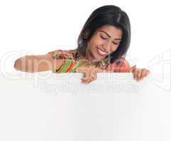 Indian woman holding blank card