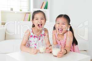 Children drinking milk.