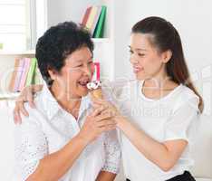 Women eating ice-cream cone