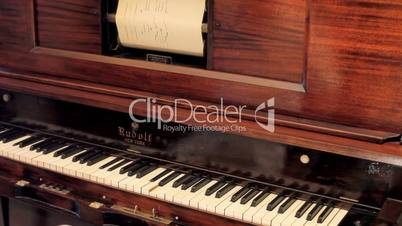 Piano vintage automatic ghost play editorial