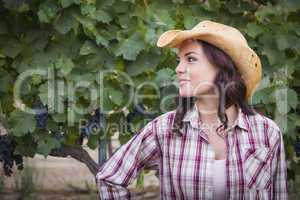 Young Adult Female Portrait Wearing Cowboy Hat in Vineyard
