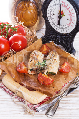 chicken breast with spinach, baked tomatoes and herbs