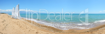 panorama of sail yachts on the beach on ionian sea at luxury hot