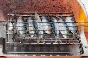 Fresh sardines on the grill