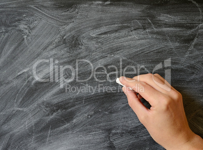 Writing on a blackboard