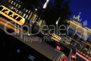 Berlin - Brandenburger Tor w Taxis and Tourists at blue hour with Light Rays