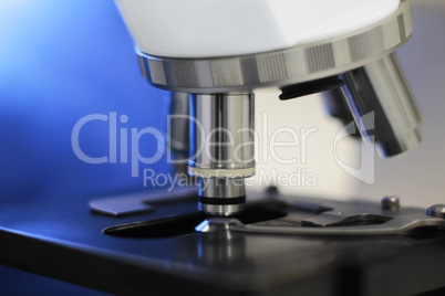 Microscope with blue background