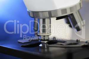 Microscope with blue background
