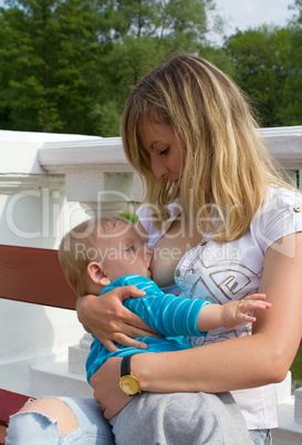 young mother breastfeeding her son