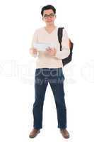 Full body Asian adult student using tablet pc