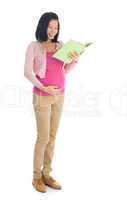pregnant Asian woman reading book