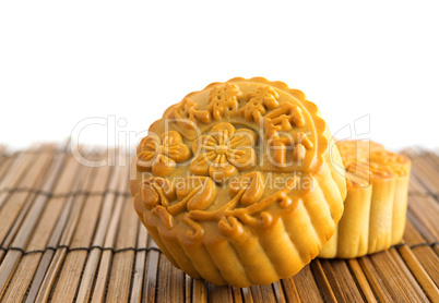 Traditional mooncakes on bamboo mat