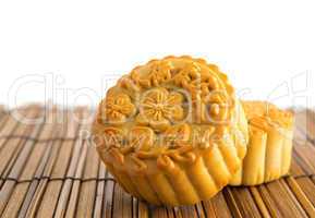 Traditional mooncakes on bamboo mat