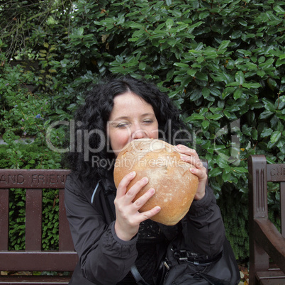 Girl eating bread