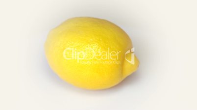 Lemon rotating on white background