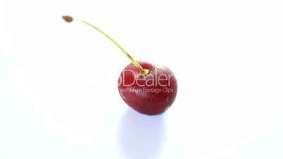 Rotating  cherry berry isolated on white background