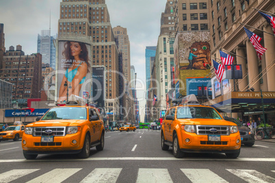 yellow taxis at the new york city street