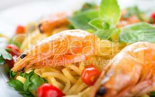 Pasta with shrimps close-up