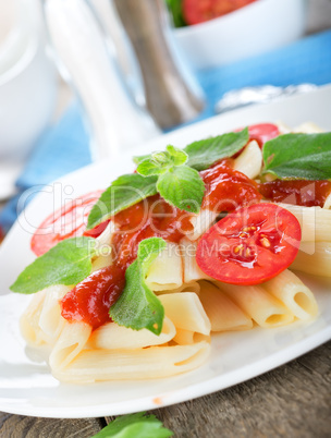 Tomatoes and ketchup on pasta