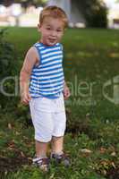 portrait of smiling three year-old boy