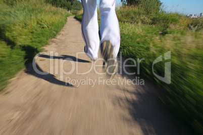 running in the park. detail of legs