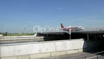 EasyJet airplane on taxiway on bridge over street canal 11028