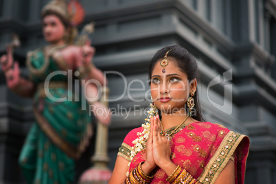 Young Indian woman praying