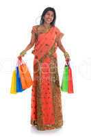 Indian woman in sari dress shopping