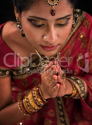 Close up Indian woman prayer