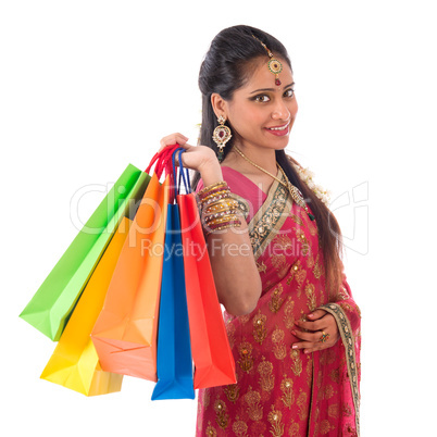 Happy Indian woman shopping