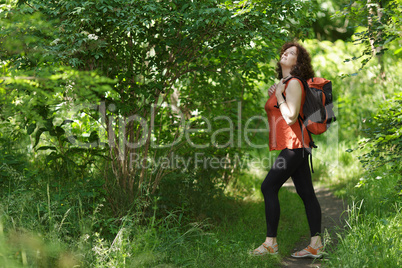 Backpacker in wild nature