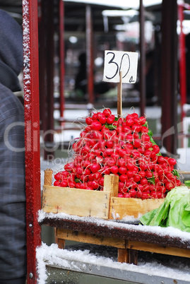 Heap of red radish on market